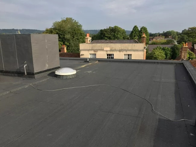 Photo of roof repairs on M&S Simply Foods.