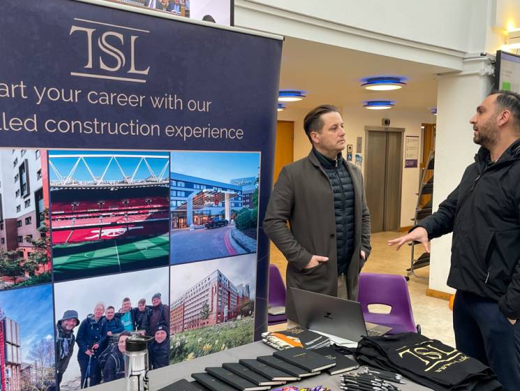 Photo of the TSL stand at a careers event.